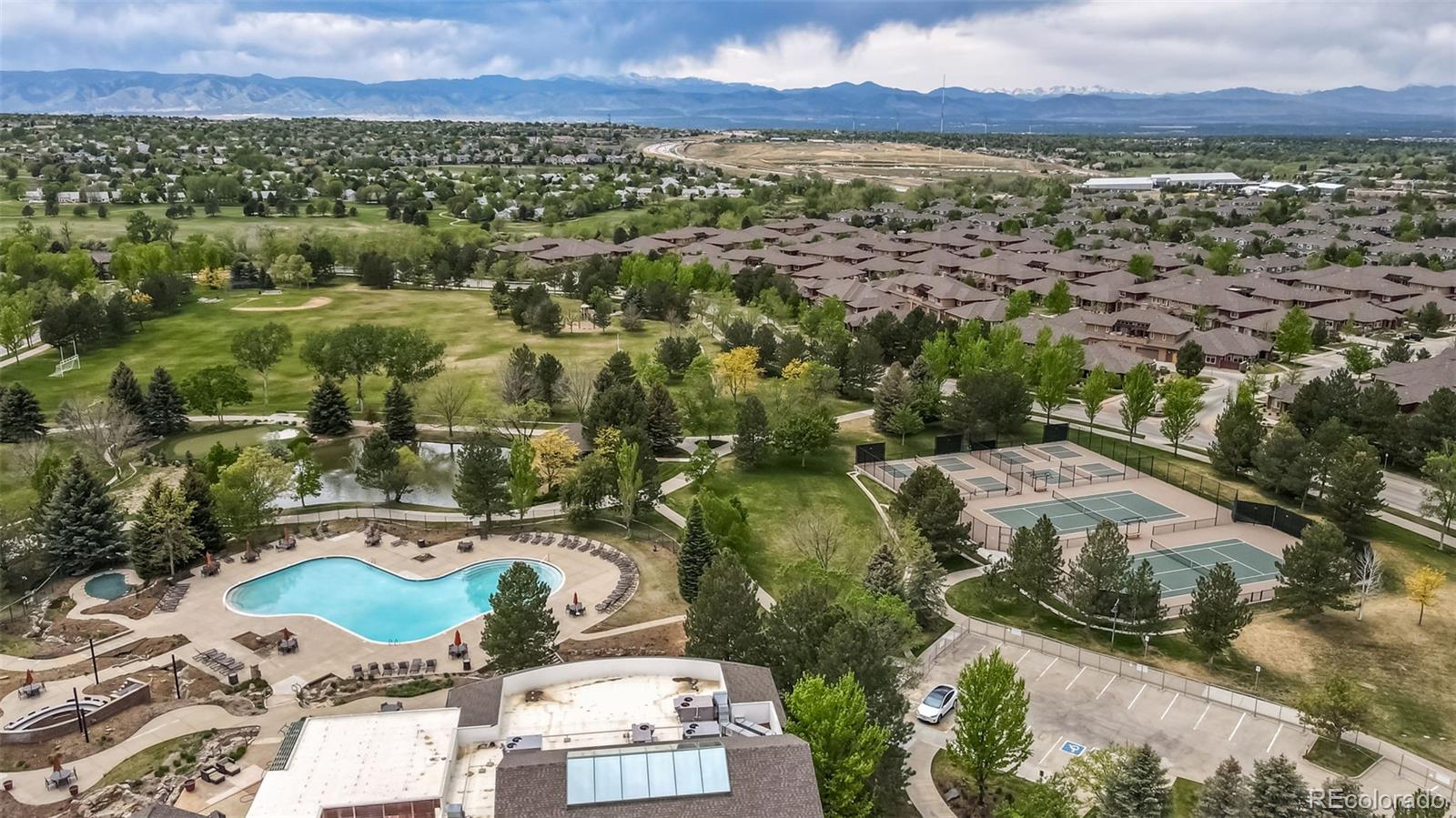 8626 Gold Peak Drive, Unit B Highlands Ranch, CO 80130 - Photo 31 of 40 an aerial view of residential houses with outdoor space