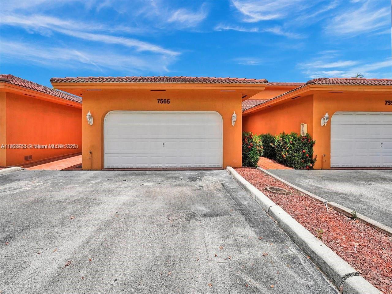 7565 Northwest 177th Terrace, Unit 7565 Hialeah, FL 33015 - Photo 17 of 35 a view of garage
