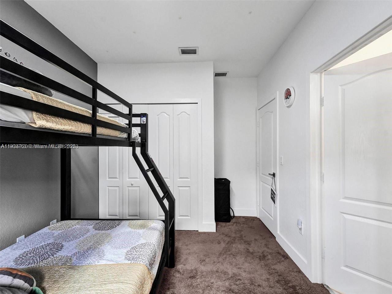 7565 Northwest 177th Terrace, Unit 7565 Hialeah, FL 33015 - Photo 7 of 35 a view of an entryway