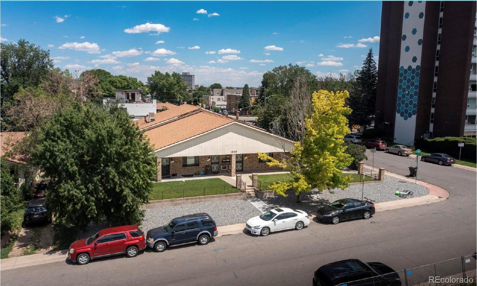 1600 Yates Street Denver, CO 80204 - Photo 1 of 20 a car parked in front of a house