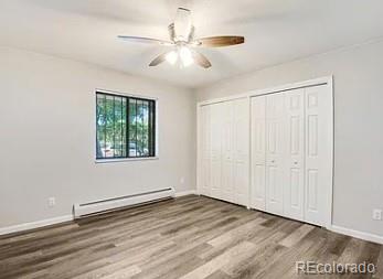 1600 Yates Street Denver, CO 80204 - Photo 13 of 20 wooden floor in an empty room with a window