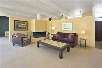 750 Del Ganado Road San Rafael, CA 94903 - Photo 11 of 13 a living room with furniture and a fireplace
