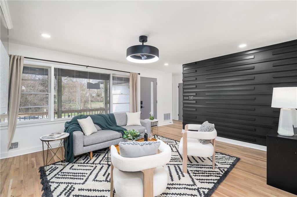 108 Burbank Drive Southwest Atlanta, GA 30314 - Photo 14 of 53 a living room with furniture and a window