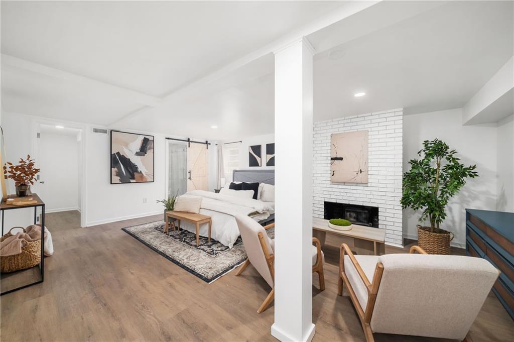 108 Burbank Drive Southwest Atlanta, GA 30314 - Photo 24 of 53 a living room with furniture fireplace and window