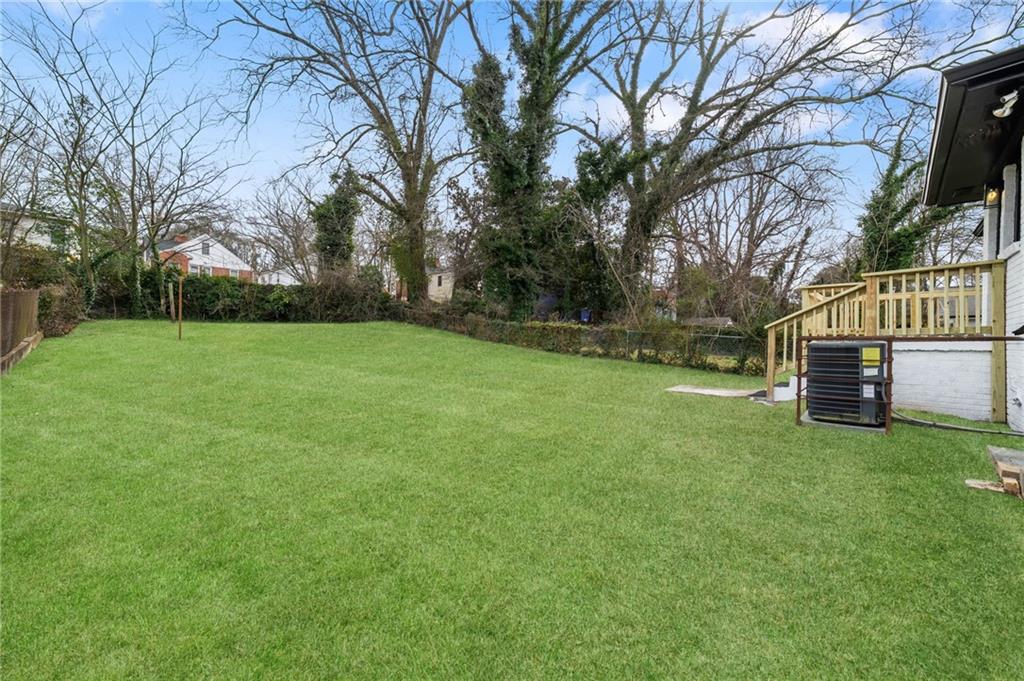 108 Burbank Drive Southwest Atlanta, GA 30314 - Photo 46 of 53 a view of backyard with green space
