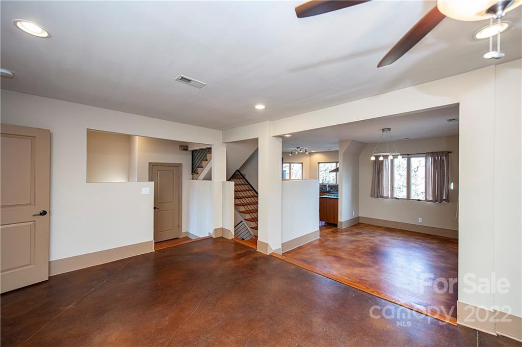 2020 Marquesas Avenue Tega Cay, SC 29708 - Photo 11 of 48 a view of a livingroom with wooden floor