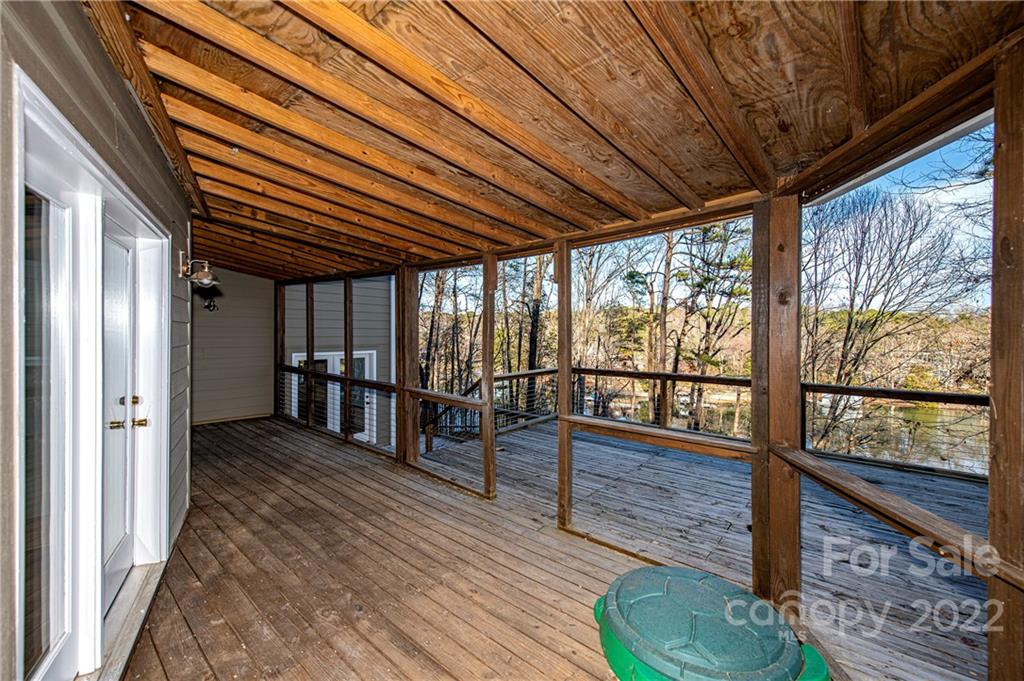 2020 Marquesas Avenue Tega Cay, SC 29708 - Photo 38 of 48 a view of hallway with wooden floor and furniture