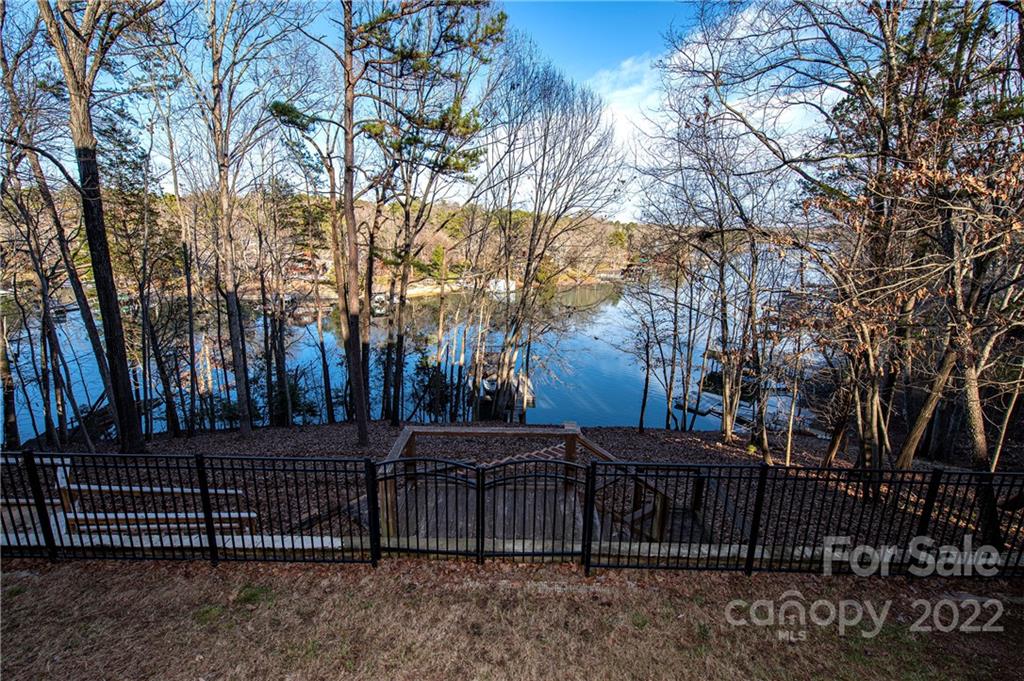 2020 Marquesas Avenue Tega Cay, SC 29708 - Photo 40 of 48 a view of a yard with wooden fence