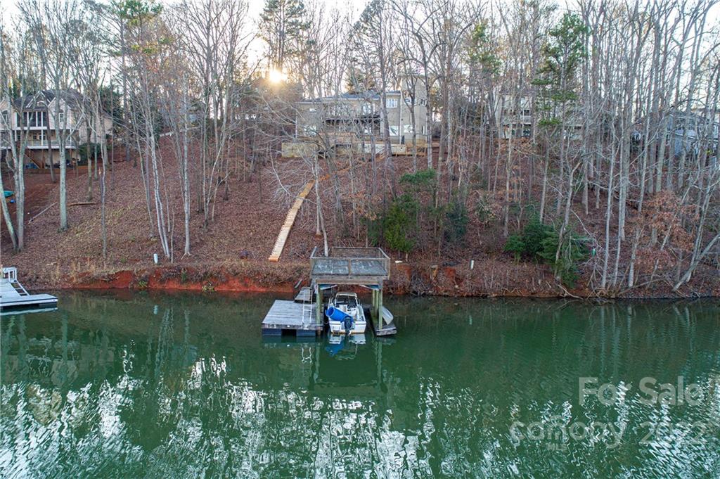 2020 Marquesas Avenue Tega Cay, SC 29708 - Photo 46 of 48 a view of a lake with a park