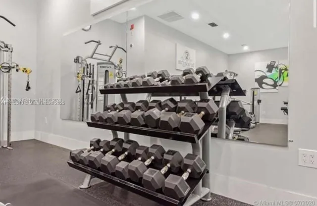 a view of a room with gym equipment