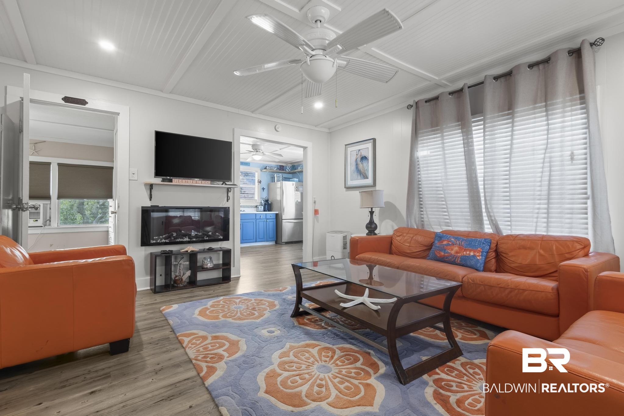 562 Veterans Road Gulf Shores, AL 36542 - Photo 13 of 32 Living area featuring ceiling fan, wood finished floors, and recessed lighting