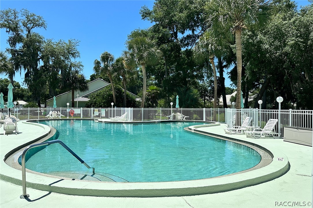 800 Balmoral Court Inverness, FL 34453 - Photo 53 of 72 a view of a swimming pool with a patio