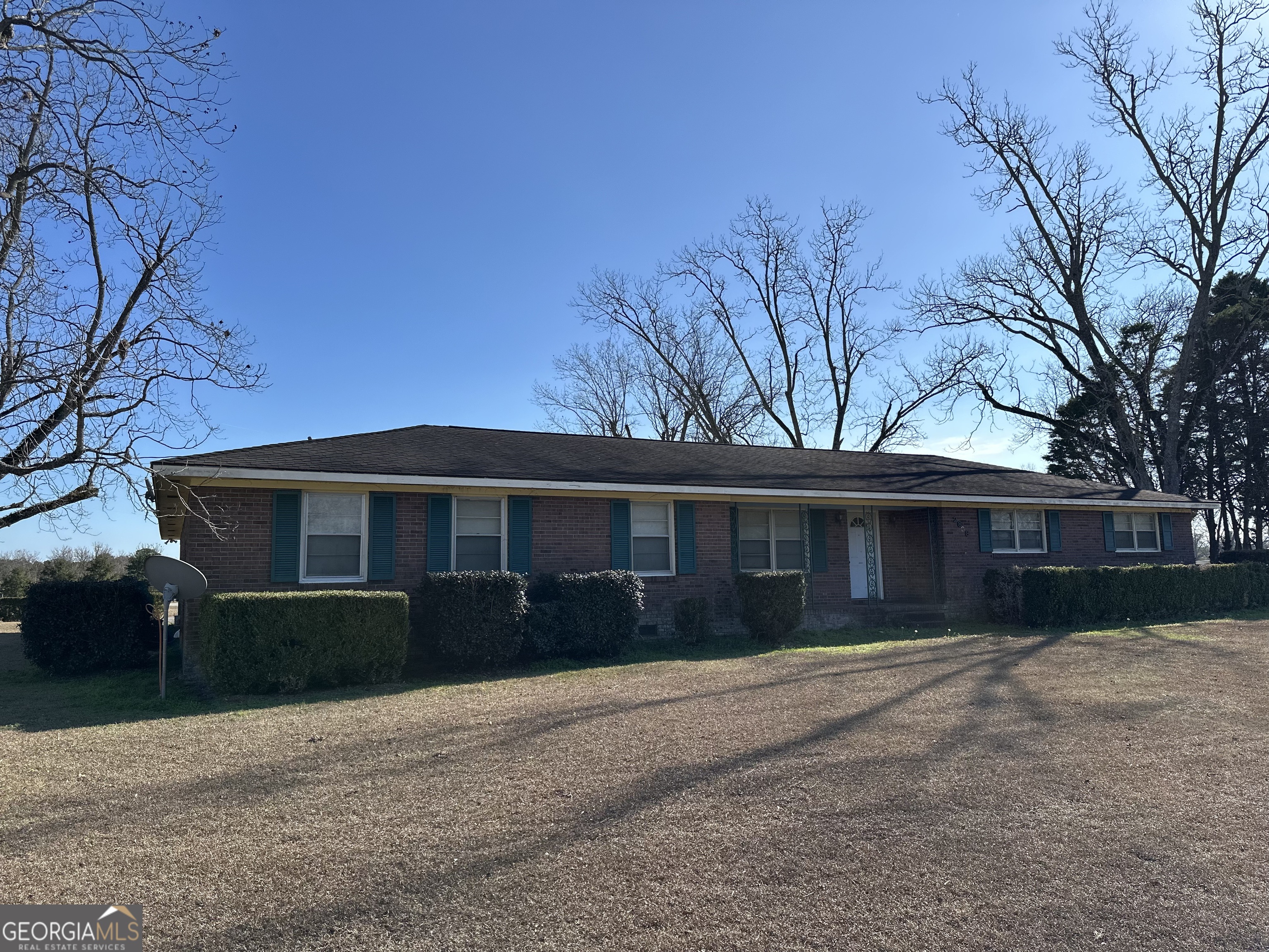 2808 Highway 117 Cadwell, GA 31009 - Photo 2 of 25 a front view of a house with a yard