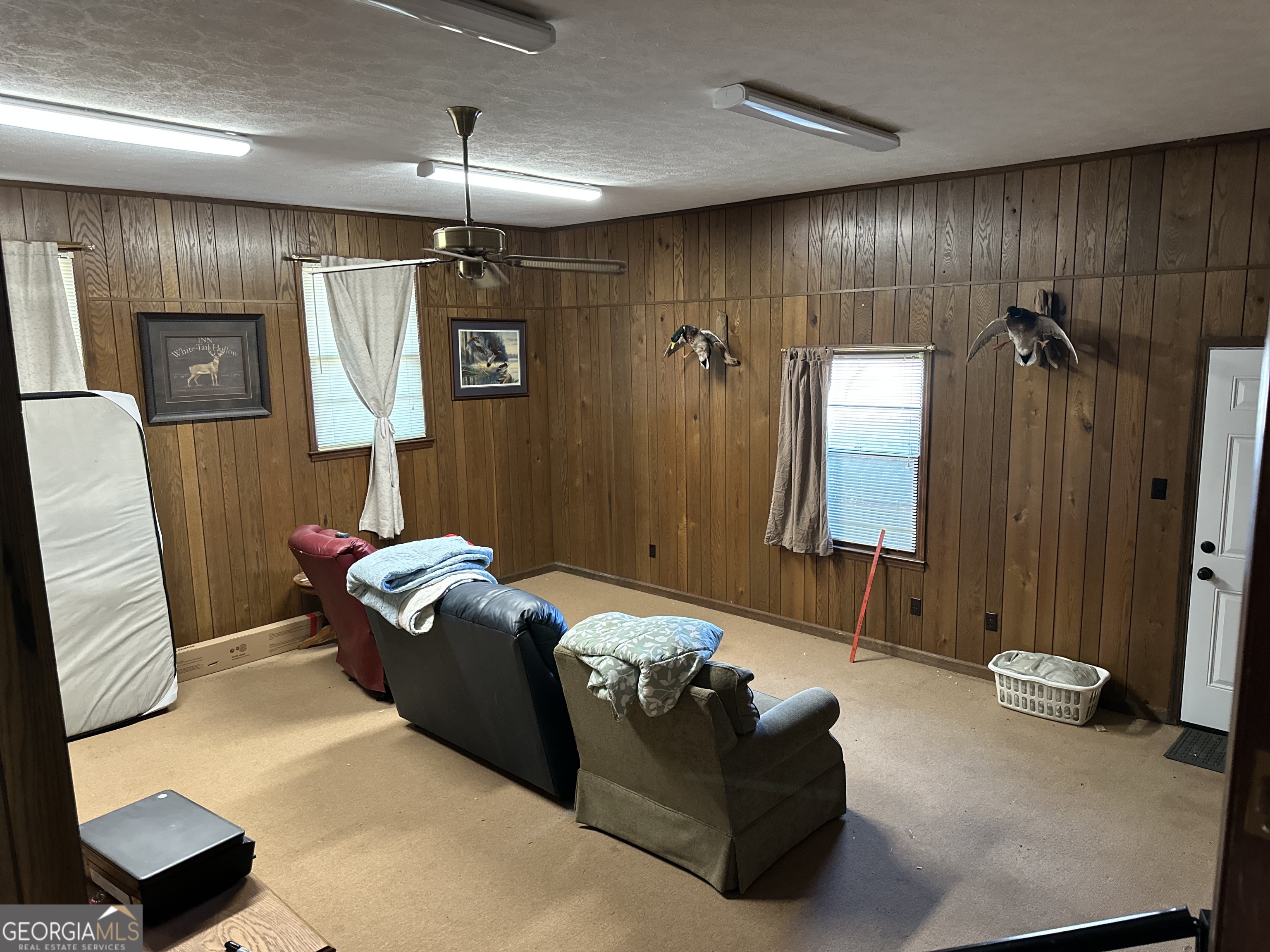 2808 Highway 117 Cadwell, GA 31009 - Photo 21 of 25 a bedroom with furniture and a window