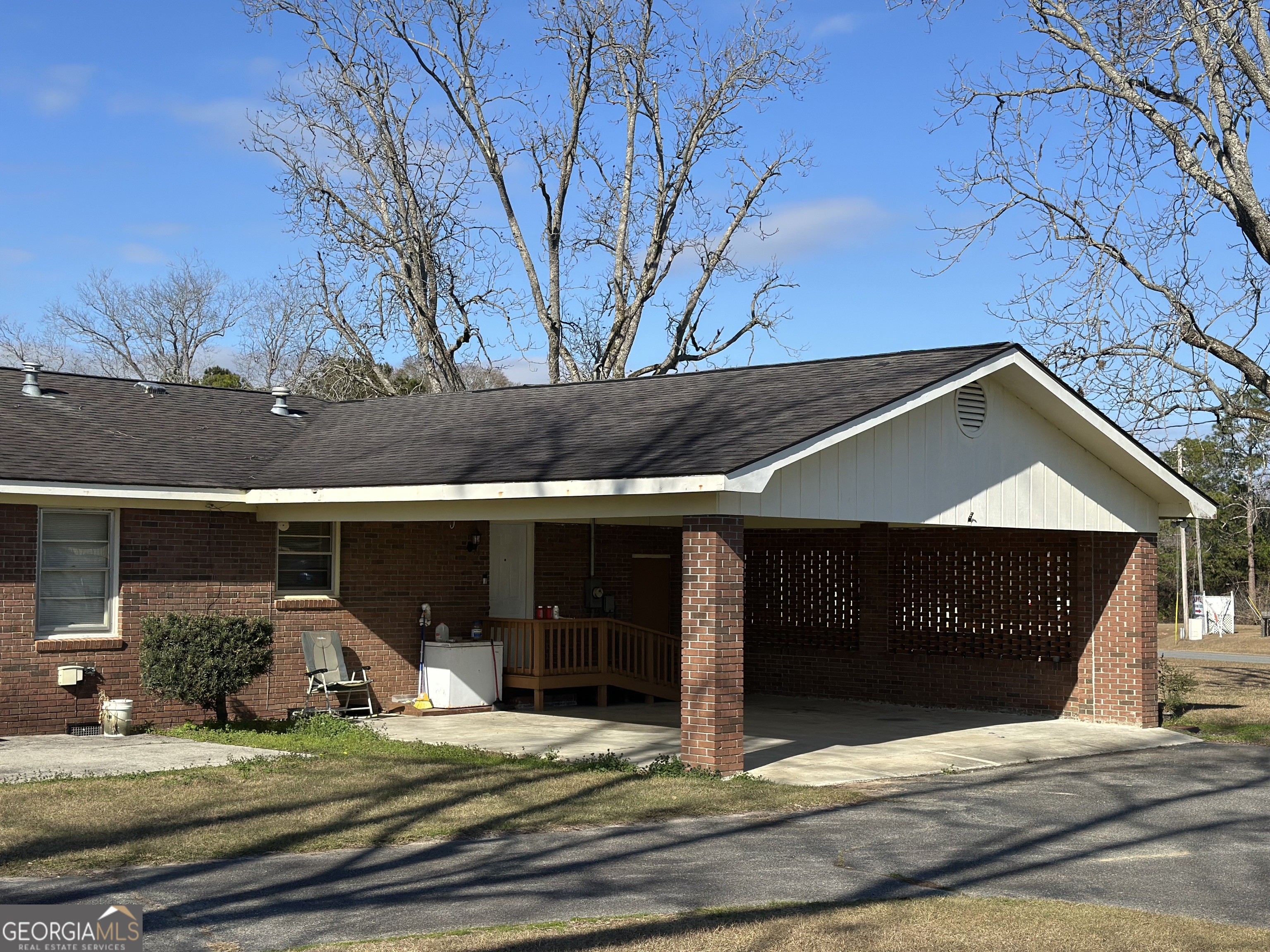 2808 Highway 117 Cadwell, GA 31009 - Photo 3 of 25 a view of a house with backyard porch and sitting area
