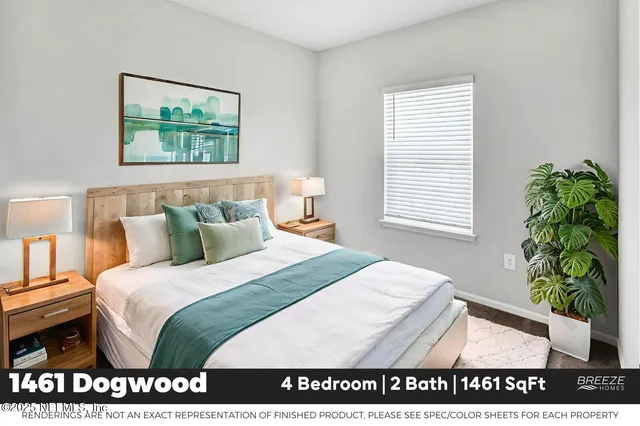 a bedroom with bed and a window