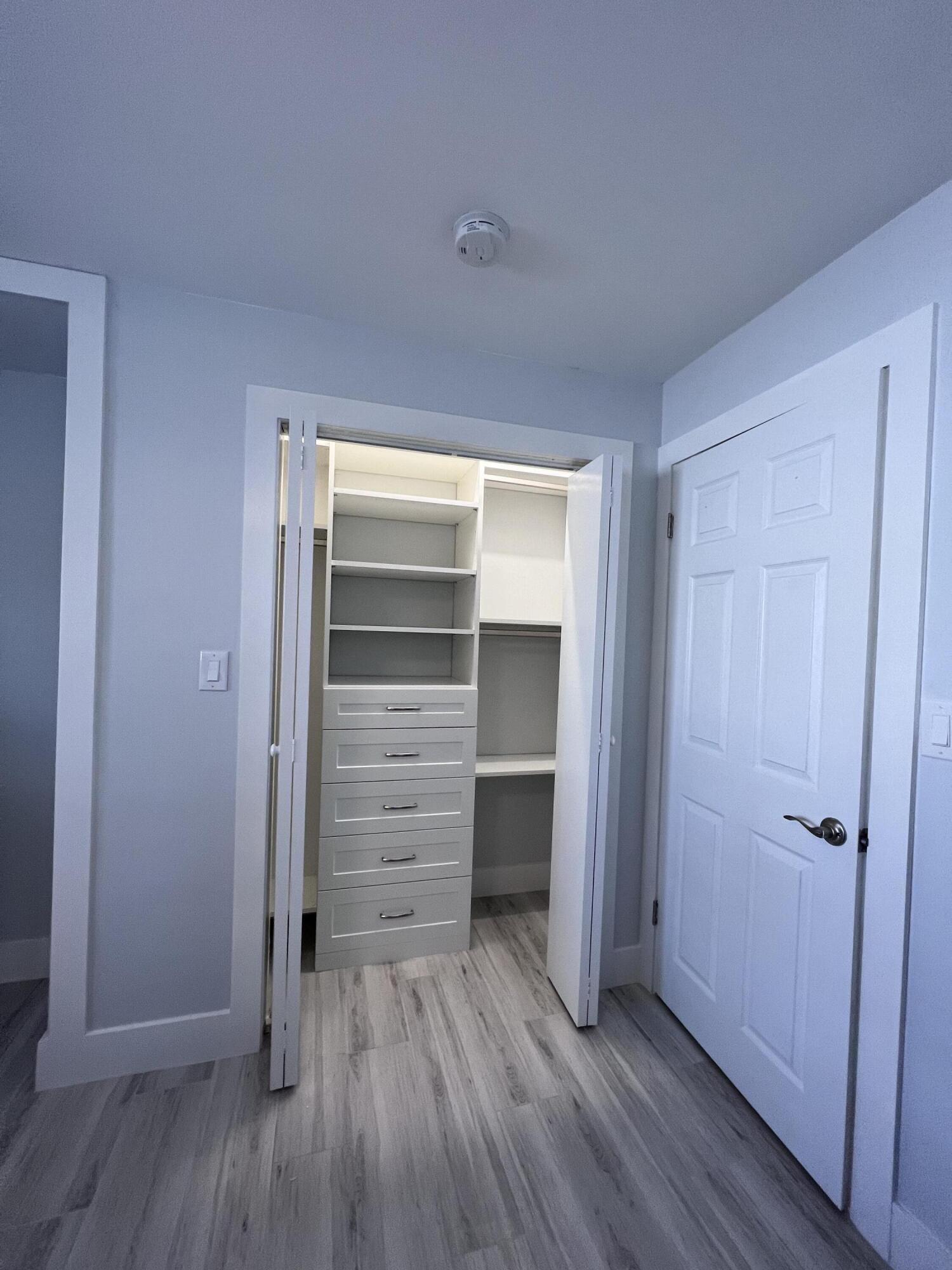 2011 Northeast 31st Street Lighthouse Point, FL 33064 - Photo 27 of 42 Guest Bedroom Closet