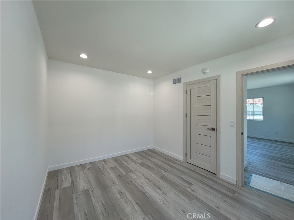 10363 Commerce Avenue Tujunga, CA 91042 - Photo 19 of 51 wooden floor in an empty room