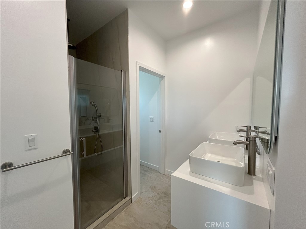10363 Commerce Avenue Tujunga, CA 91042 - Photo 39 of 51 a bathroom with a sink toilet and shower