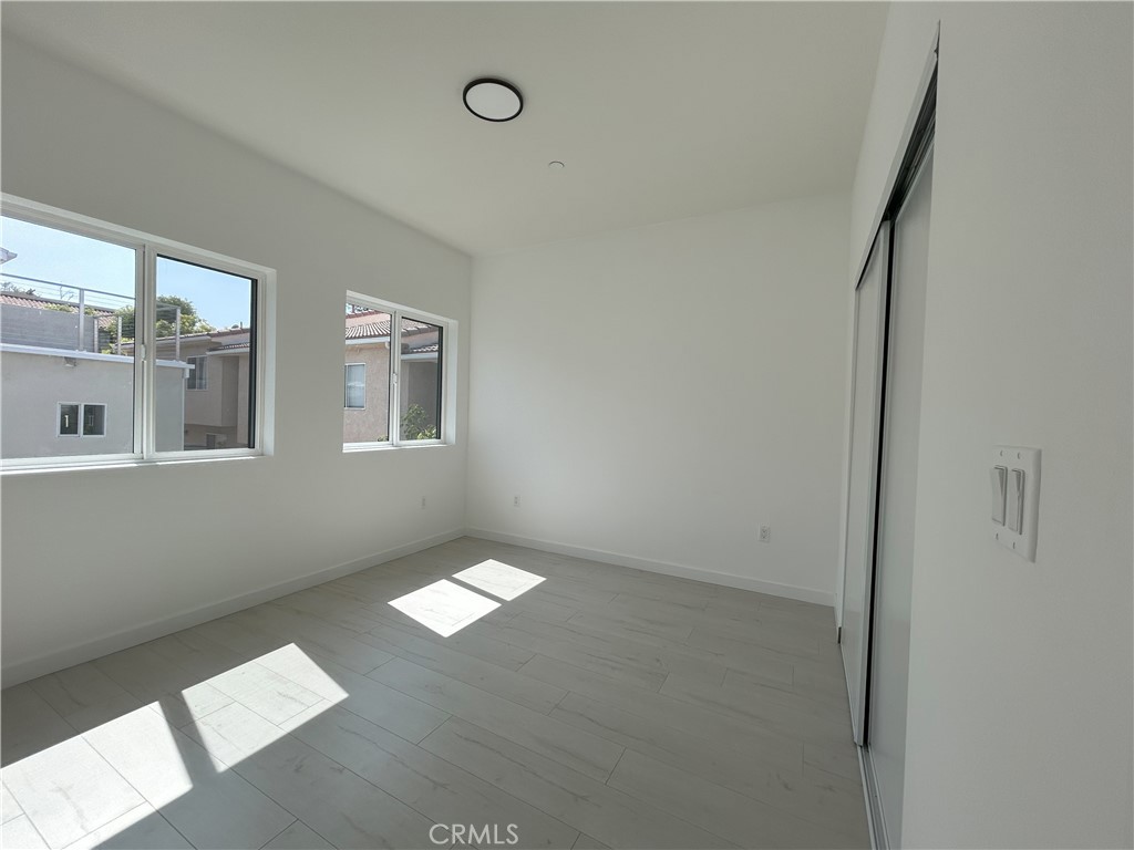 10363 Commerce Avenue Tujunga, CA 91042 - Photo 48 of 51 an empty room with windows