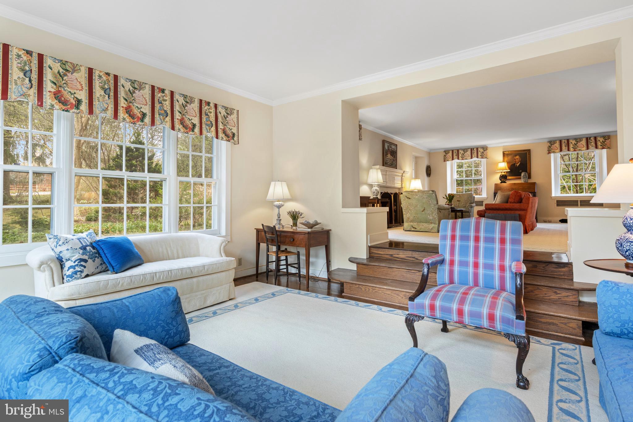 331 Fishers Road Bryn Mawr, PA 19010 - Photo 12 of 64 a living room with furniture and floor to ceiling windows