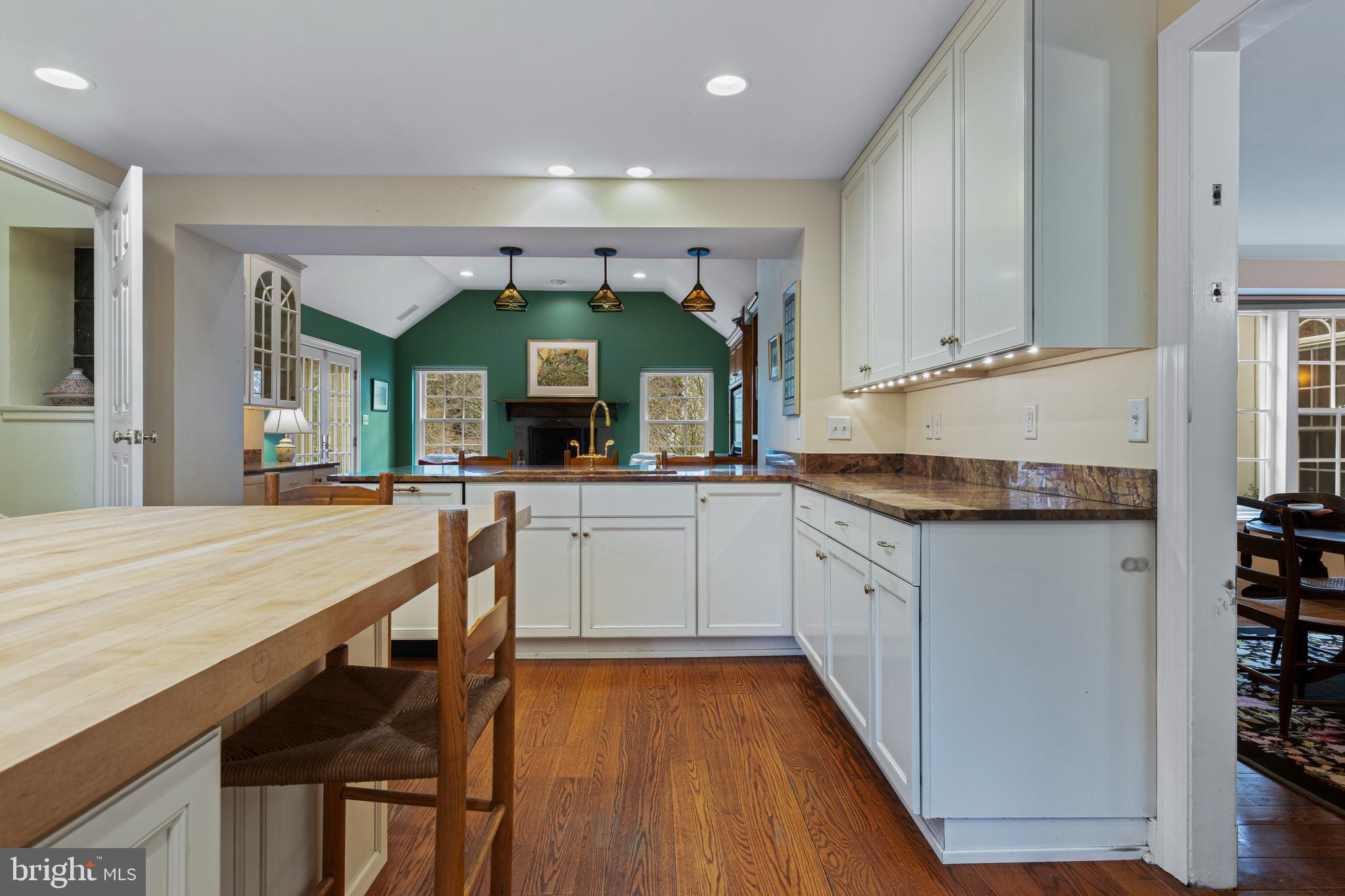 331 Fishers Road Bryn Mawr, PA 19010 - Photo 18 of 64 a kitchen with granite countertop white cabinets and white appliances