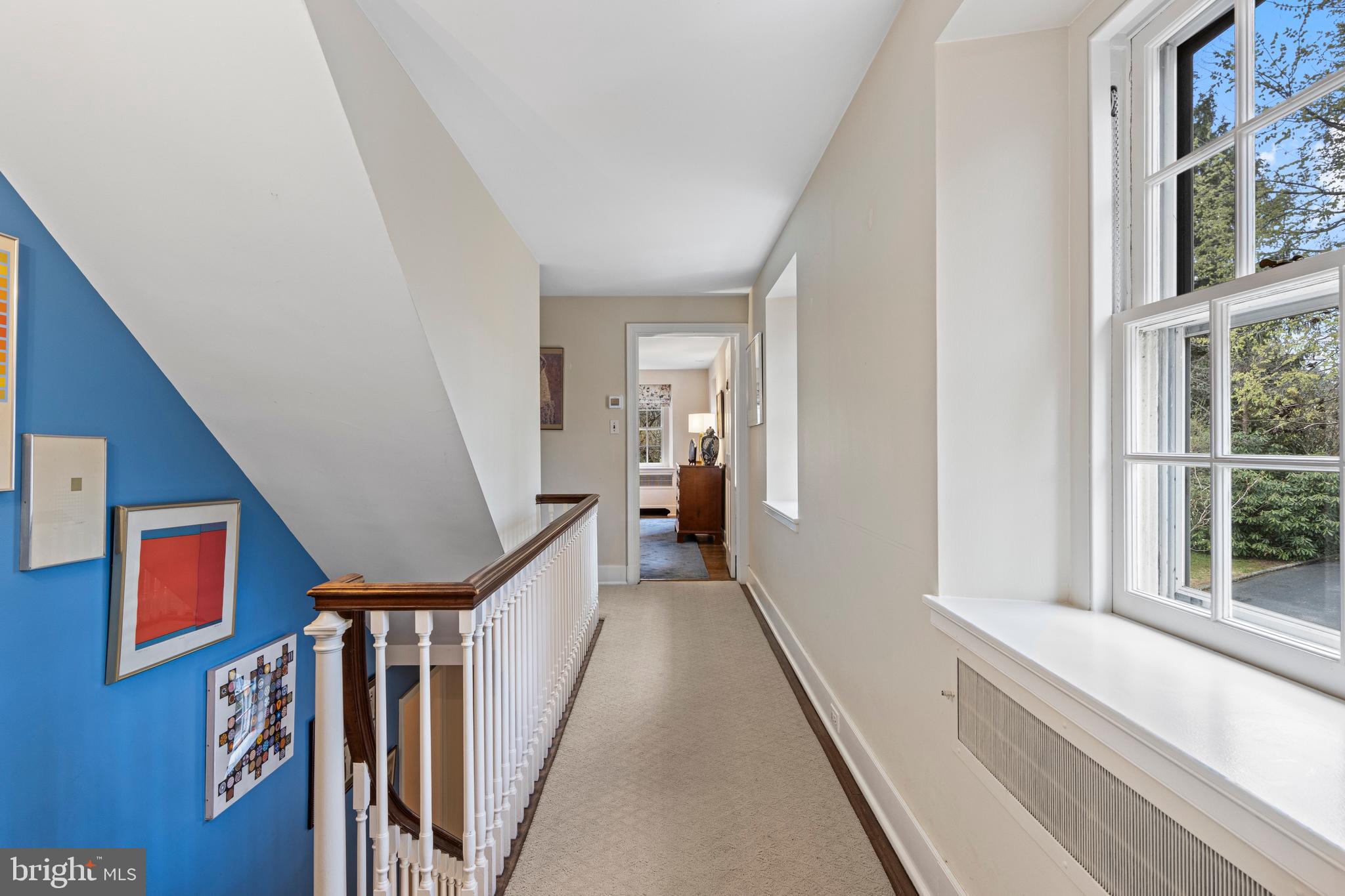 331 Fishers Road Bryn Mawr, PA 19010 - Photo 28 of 64 a view of a hallway with wooden floor and staircase