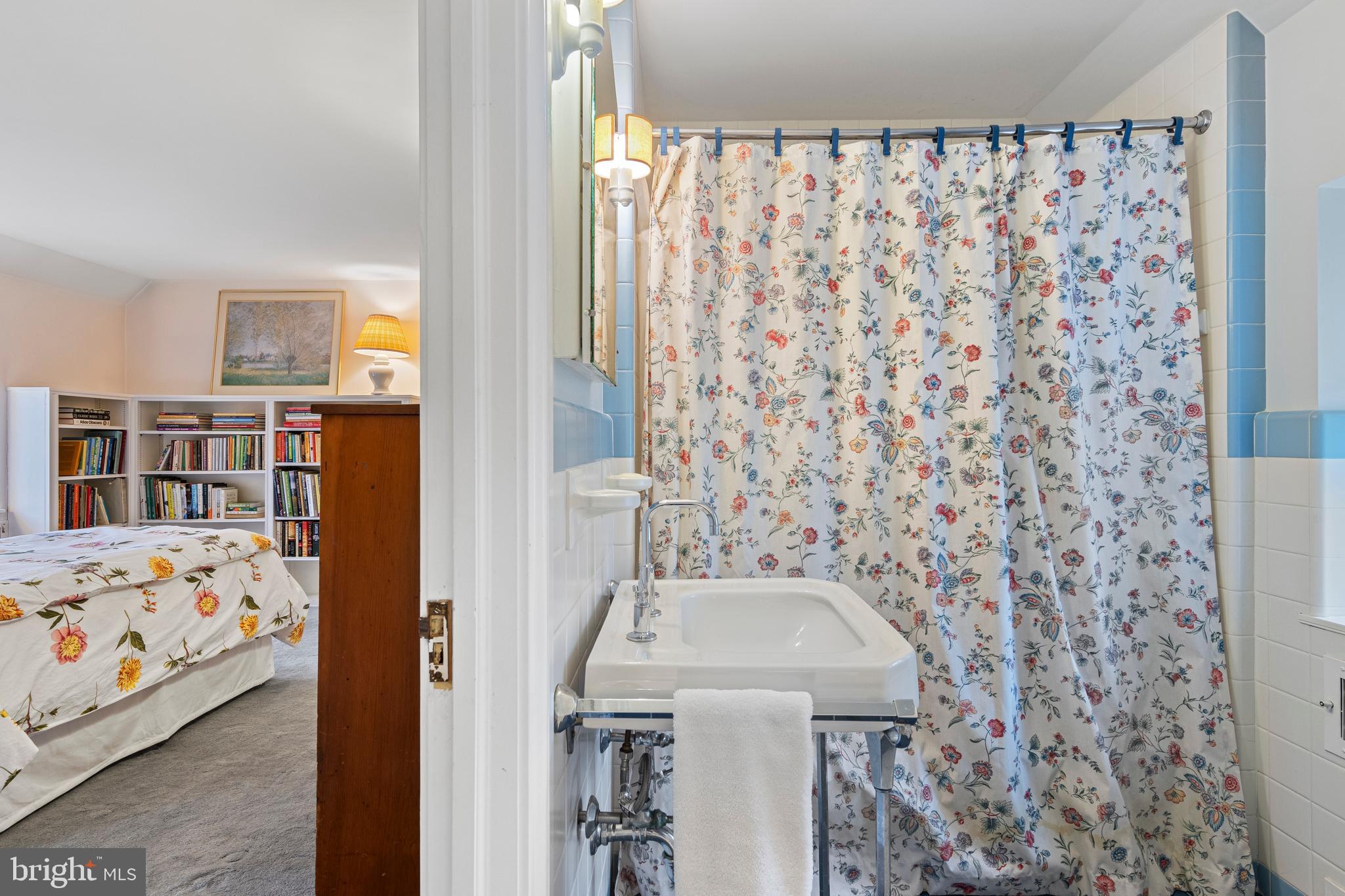 331 Fishers Road Bryn Mawr, PA 19010 - Photo 38 of 64 a bathroom with a sink and a mirror