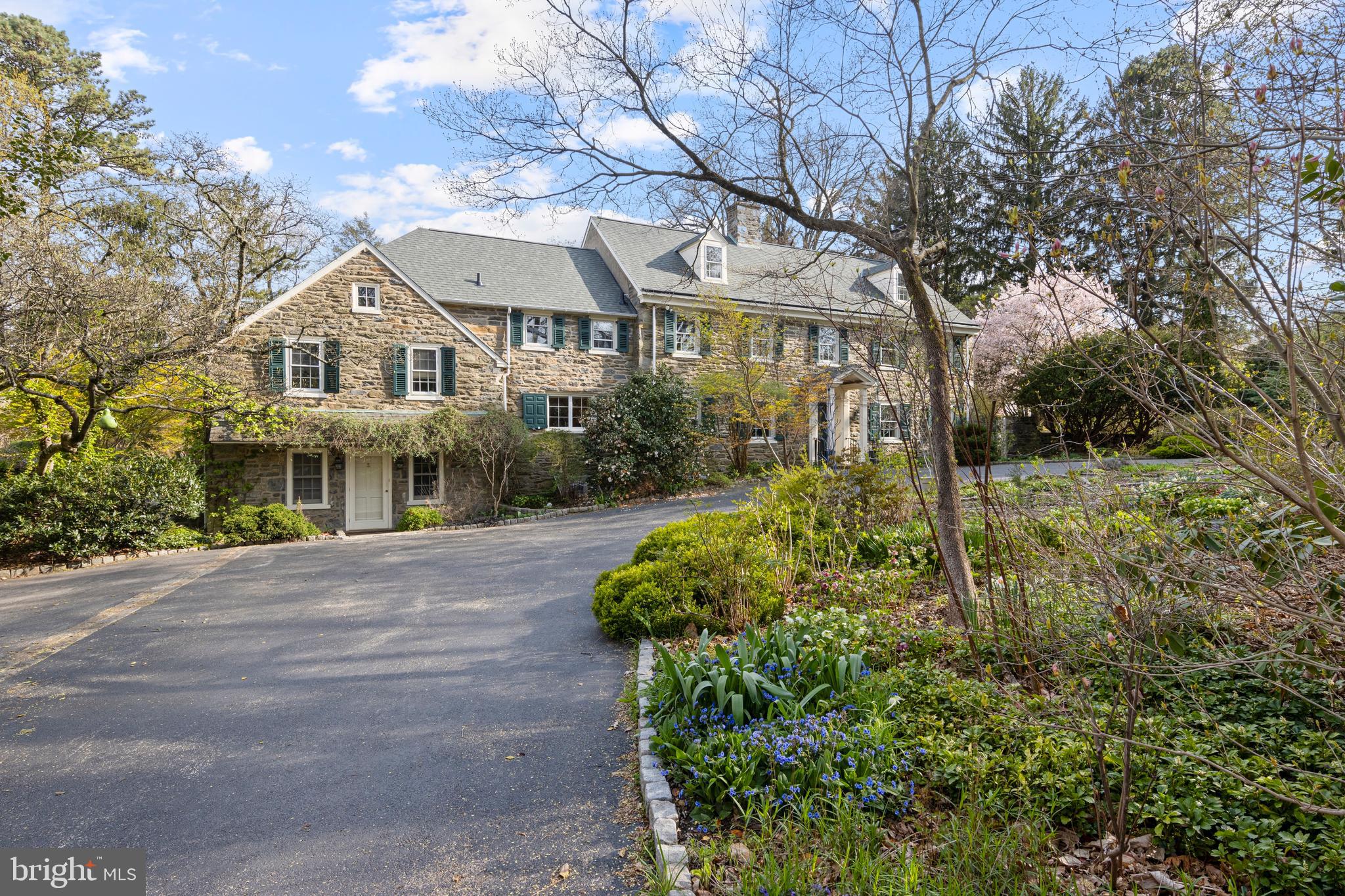 331 Fishers Road Bryn Mawr, PA 19010 - Photo 4 of 64 a front view of house with a garden