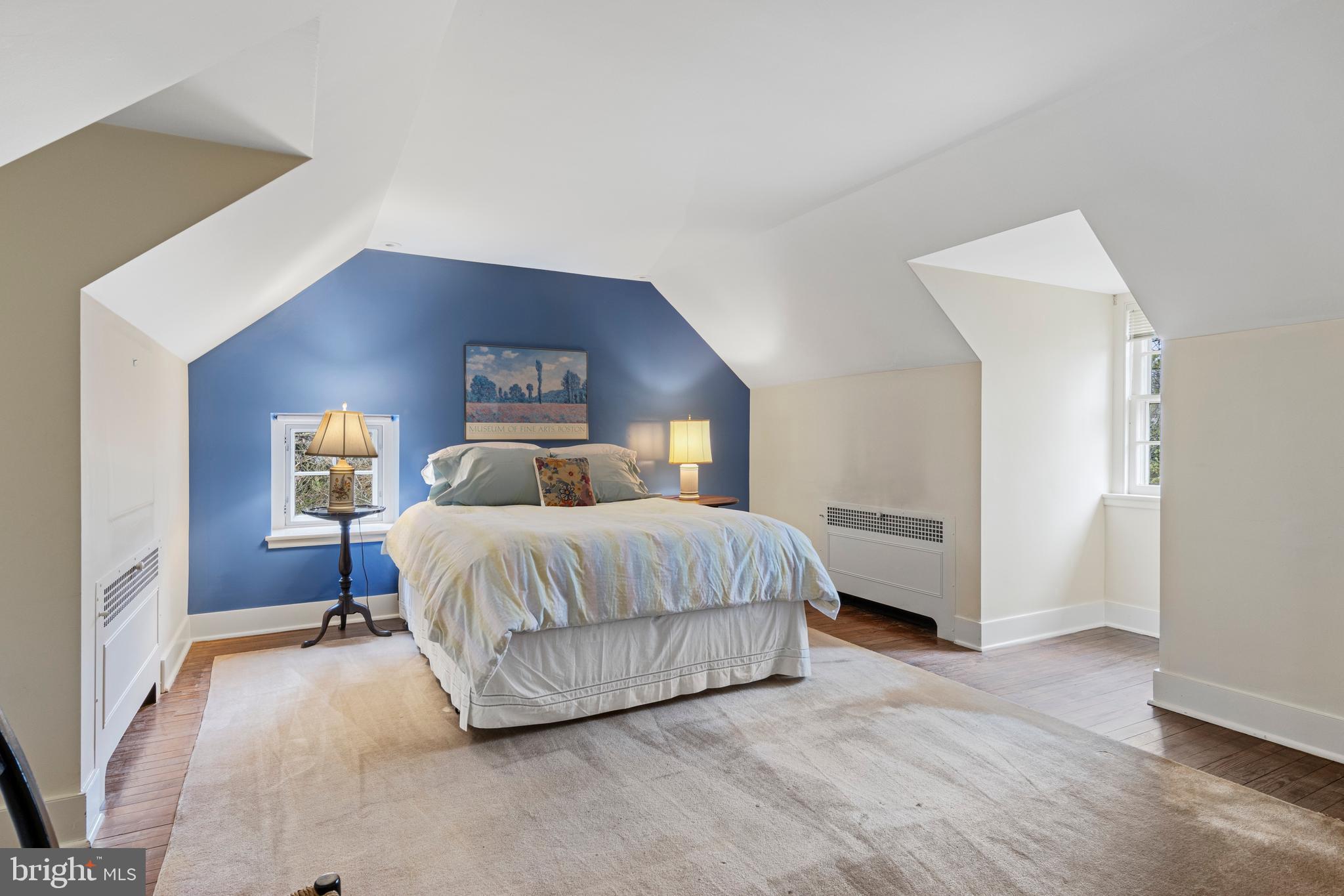 331 Fishers Road Bryn Mawr, PA 19010 - Photo 45 of 64 a spacious bedroom with a bed and a window