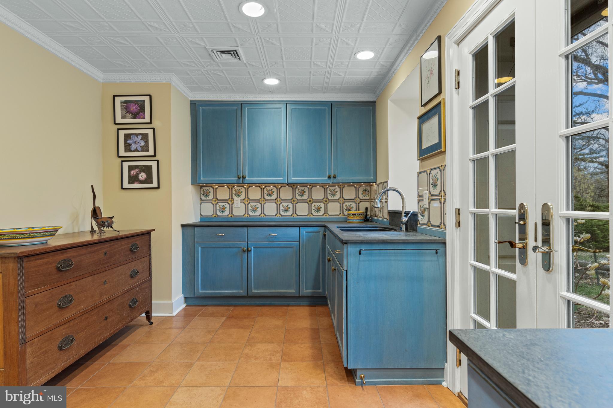 331 Fishers Road Bryn Mawr, PA 19010 - Photo 55 of 64 a kitchen with granite countertop cabinets and wooden floor