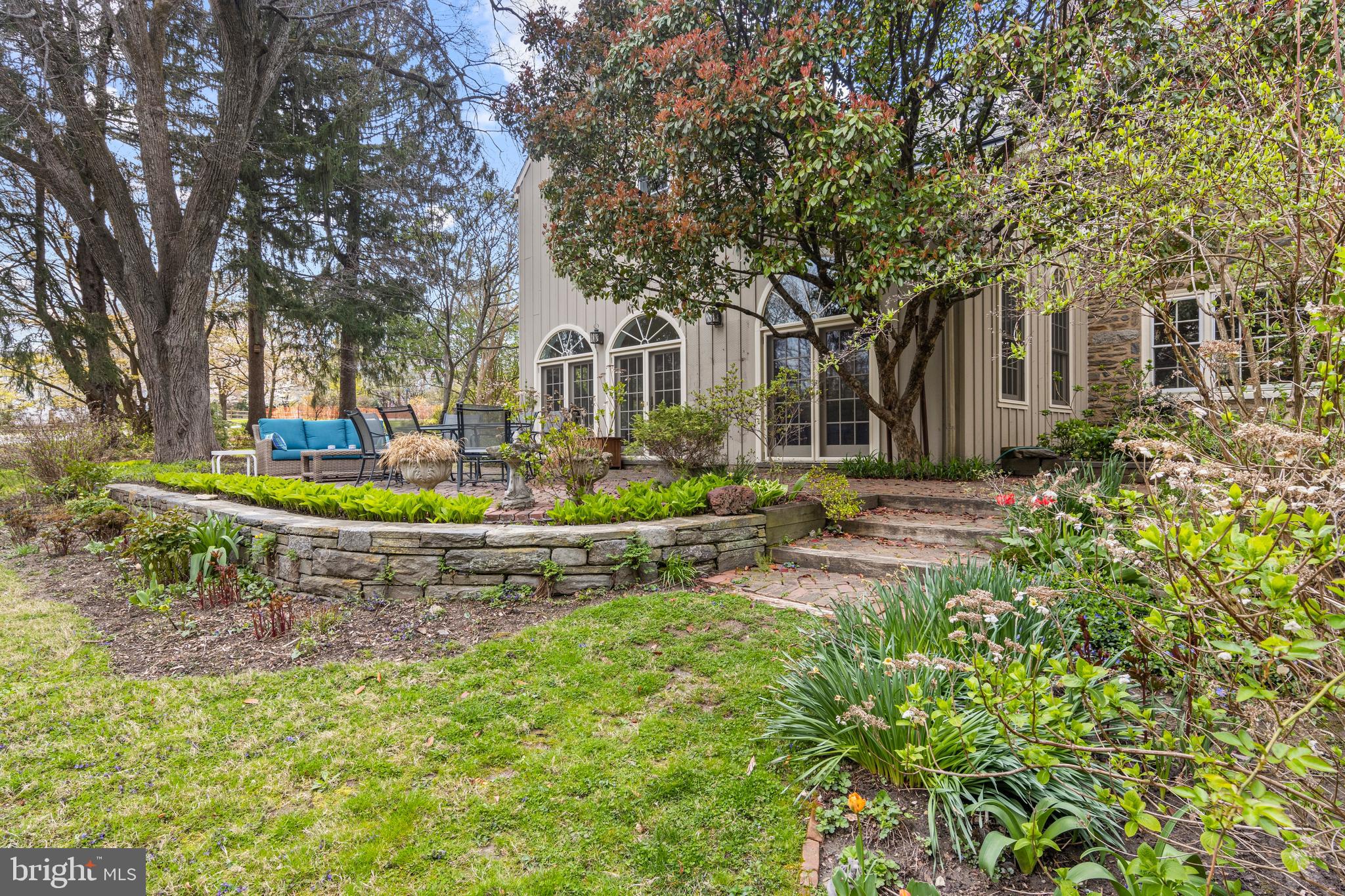 331 Fishers Road Bryn Mawr, PA 19010 - Photo 59 of 64 a front view of a house with garden