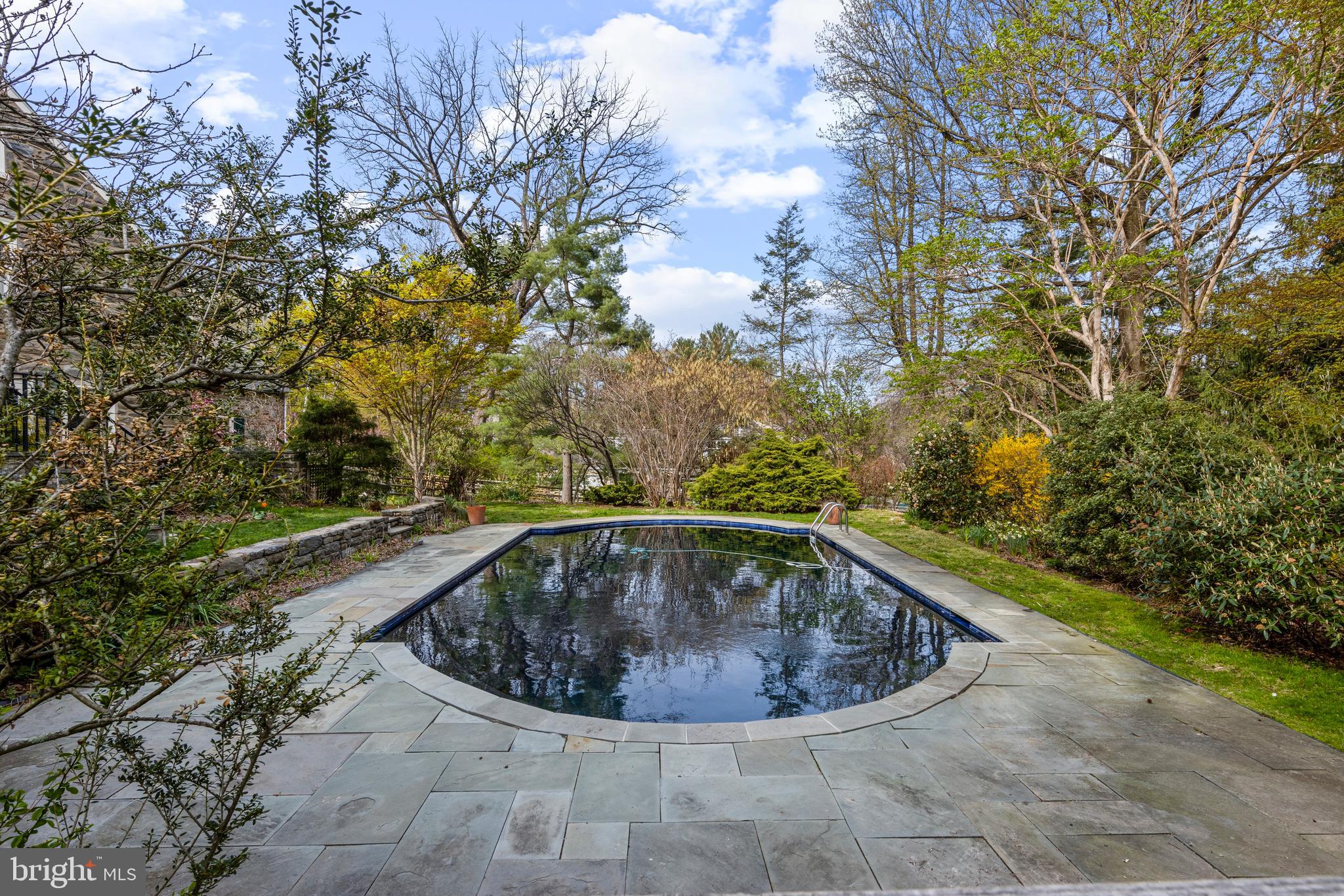 331 Fishers Road Bryn Mawr, PA 19010 - Photo 6 of 64 a view of a swimming pool with a yard