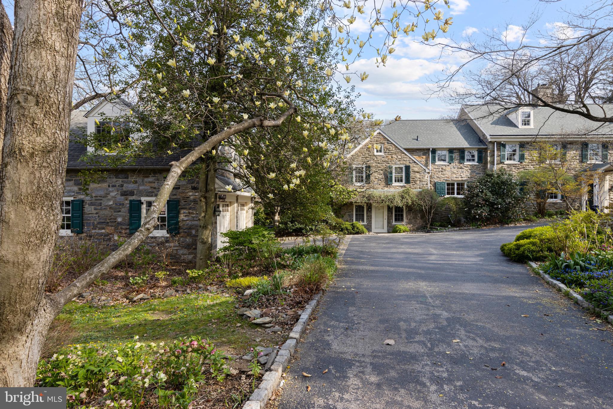 331 Fishers Road Bryn Mawr, PA 19010 - Photo 63 of 64 a front view of a house with a yard