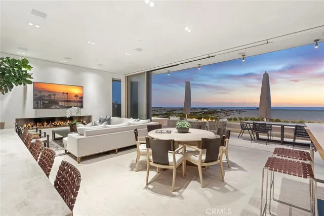 a living room with fireplace furniture and a flat screen tv