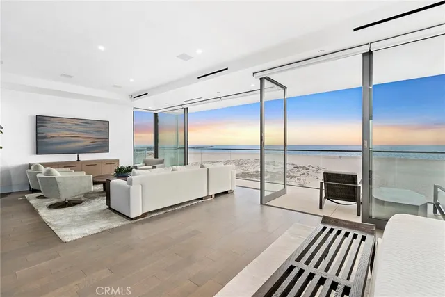 a living room with furniture fireplace and flat screen tv