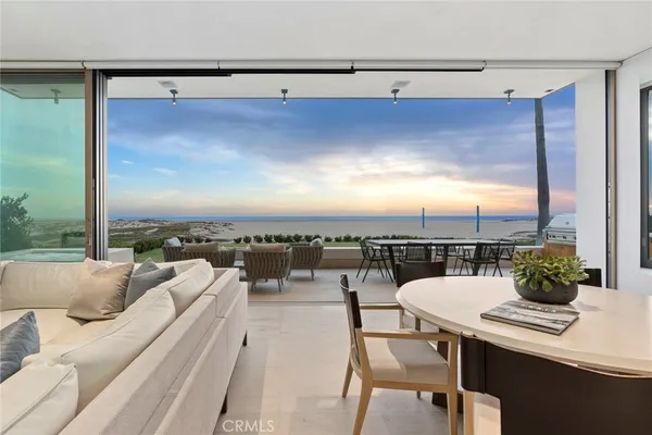 a terrace with a table and chairs