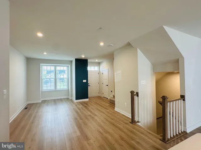 a view of entryway with wooden floor