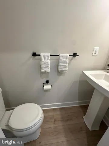 a view of entryway with wooden floor