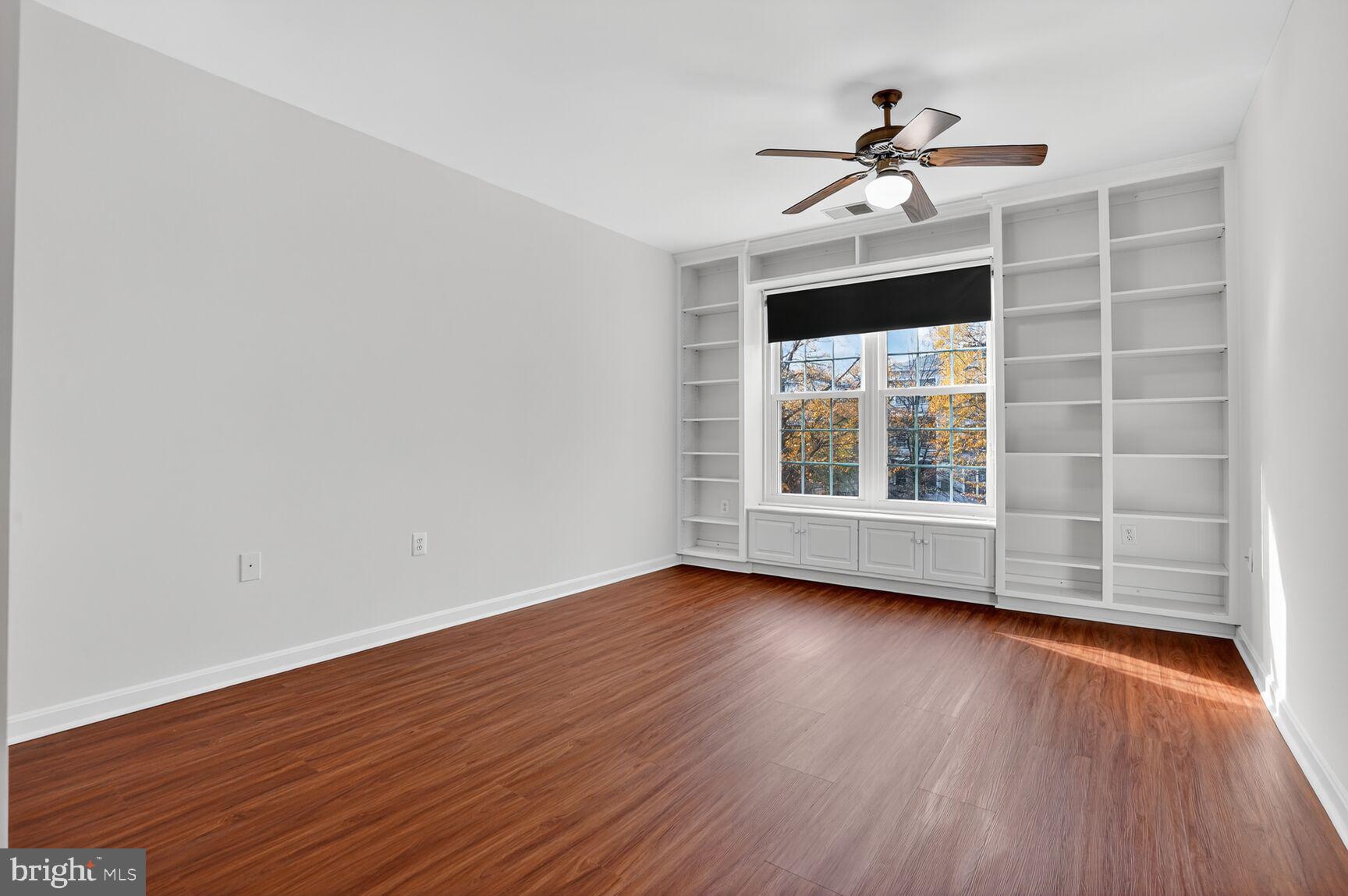 4300 Cannon Ridge Court, Unit 14 Fairfax, VA 22033 - Photo 11 of 23 a view of wooden floor and a chandelier fan in living room