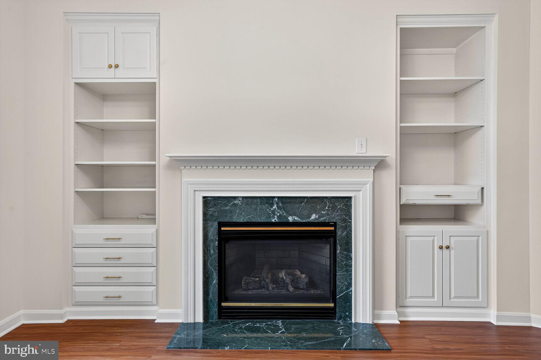 4300 Cannon Ridge Court, Unit 14 Fairfax, VA 22033 - Photo 2 of 23 a living room with a fireplace