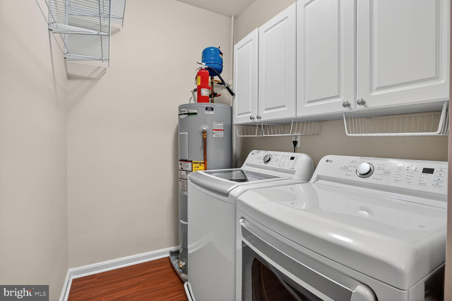 4300 Cannon Ridge Court, Unit 14 Fairfax, VA 22033 - Photo 22 of 23 a utility room with dryer and washer