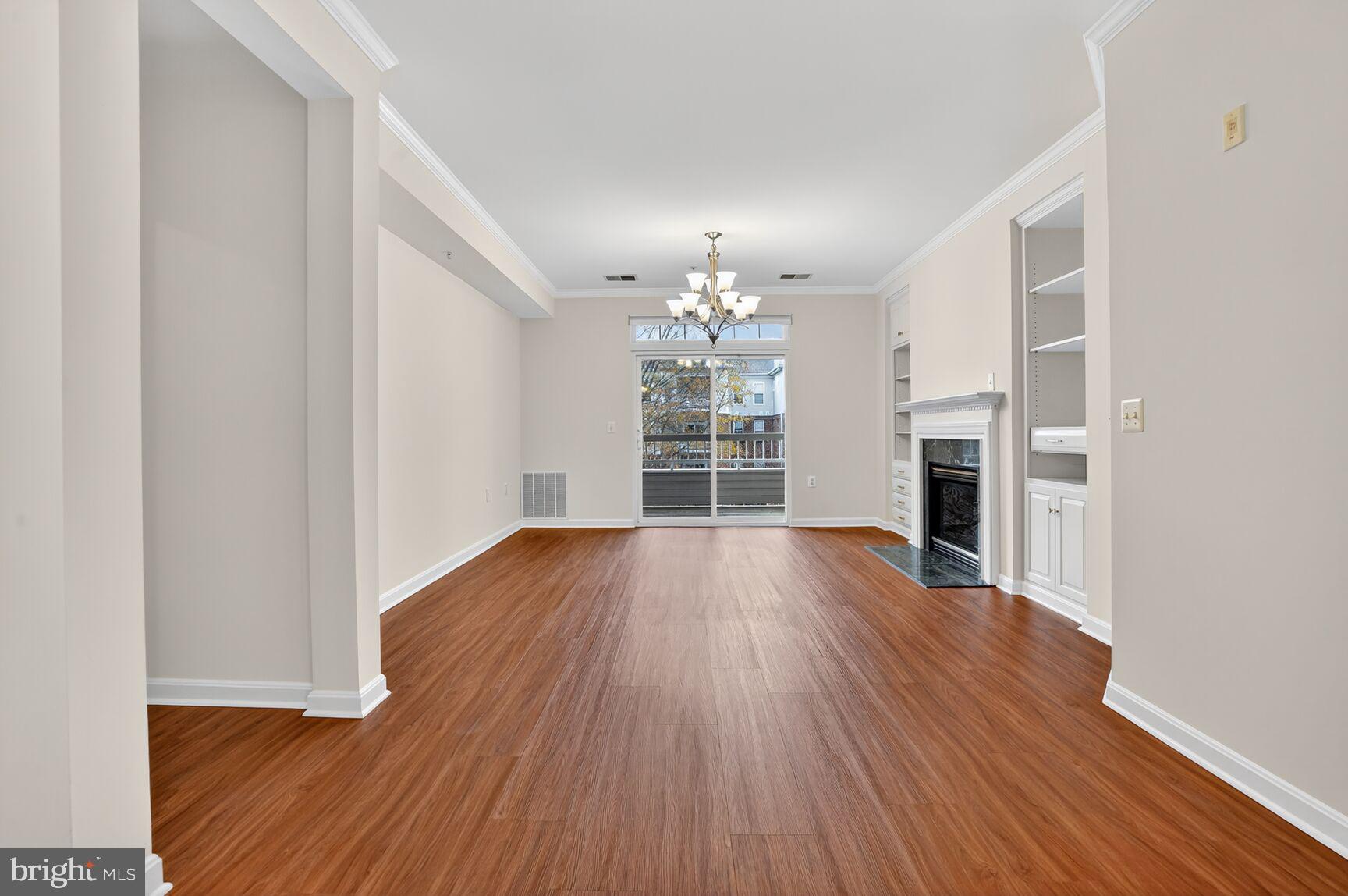 4300 Cannon Ridge Court, Unit 14 Fairfax, VA 22033 - Photo 3 of 23 wooden floor in an empty room with a window