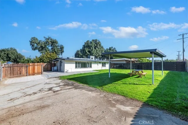 a view of a house with a big yard