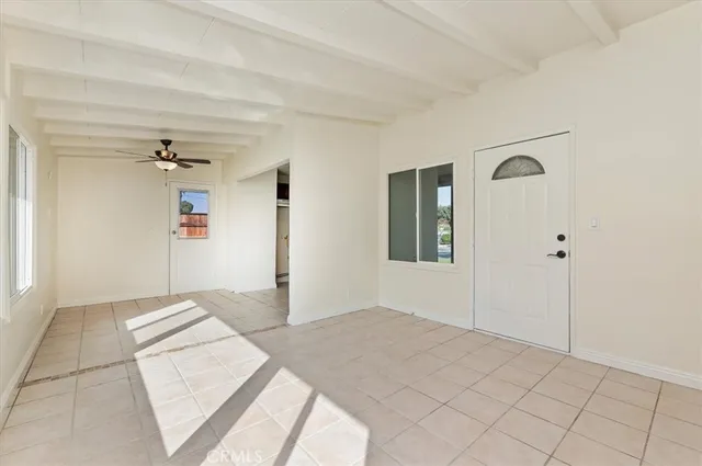 a view of a hallway to a bedroom