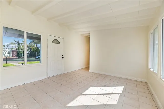 a view of an empty room and window