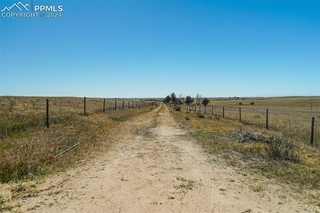22309 Murphy Road Peyton, CO 80831 - Photo 4 of 16 View of street with a rural view