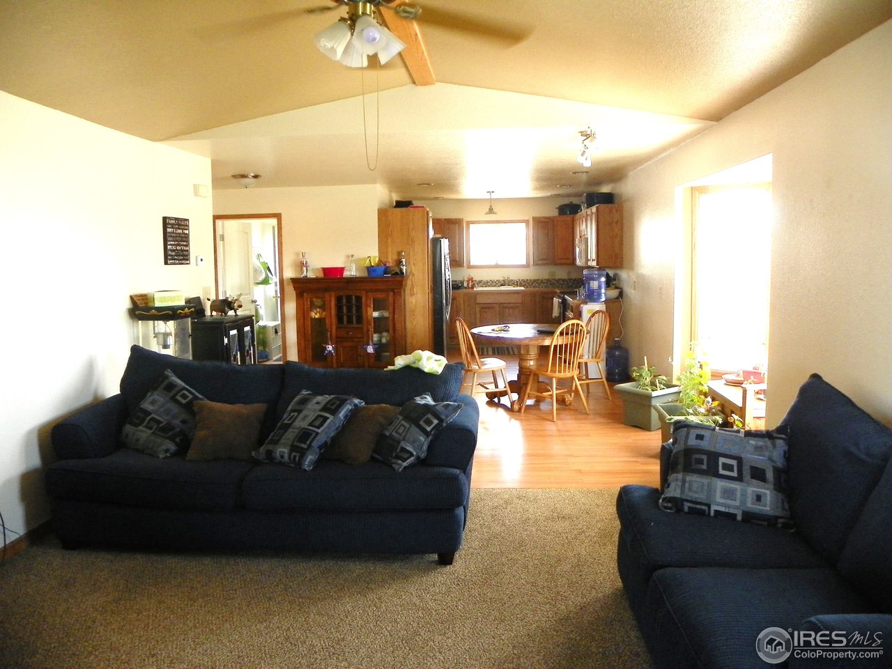 520 Right Of Way Road Sterling, CO 80751 - Photo 4 of 17 LIVING ROOM TO KITCHEN