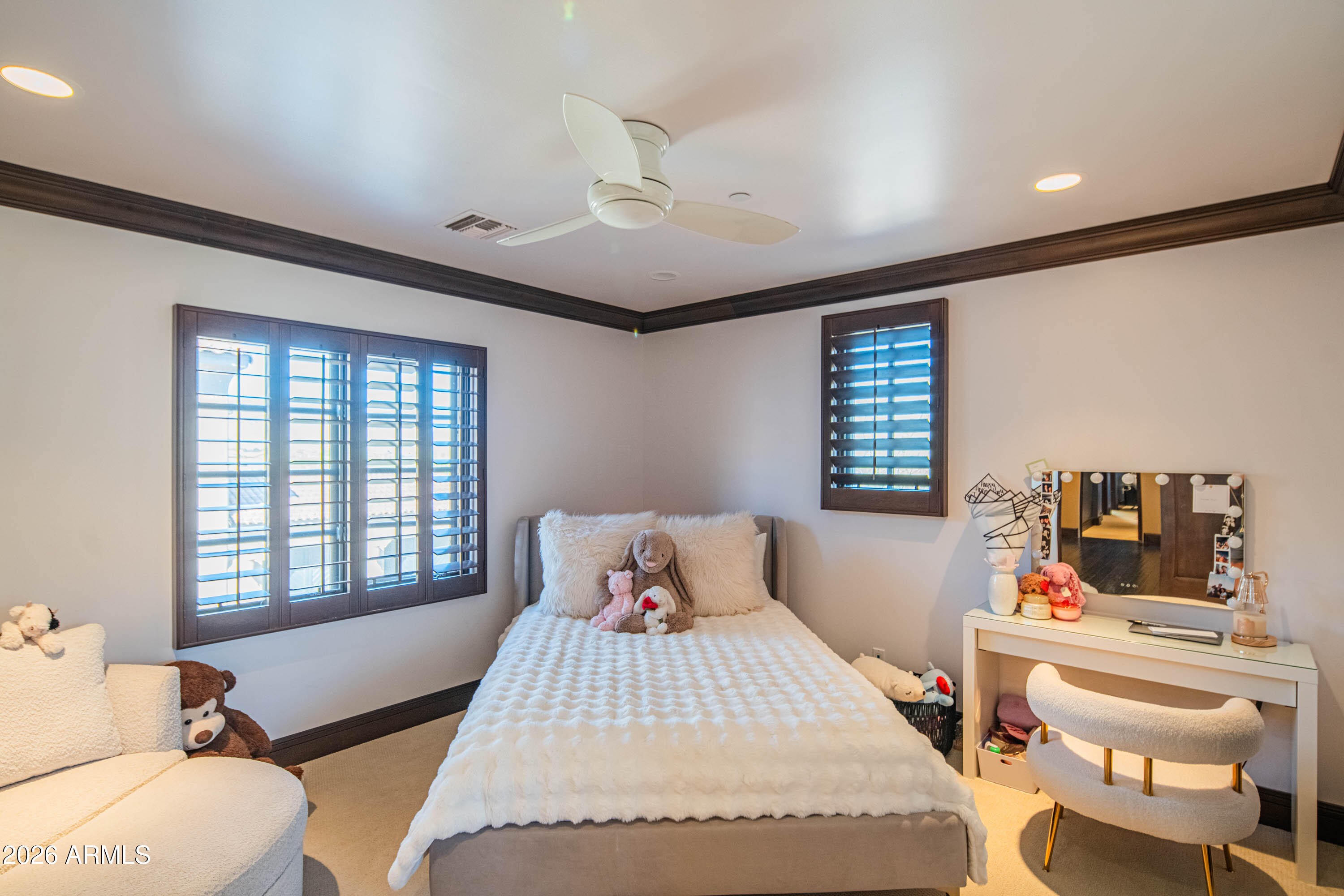 21401 West Granite Ridge Road Buckeye, AZ 85396 - Photo 110 of 144 a bedroom with a large bed and a window