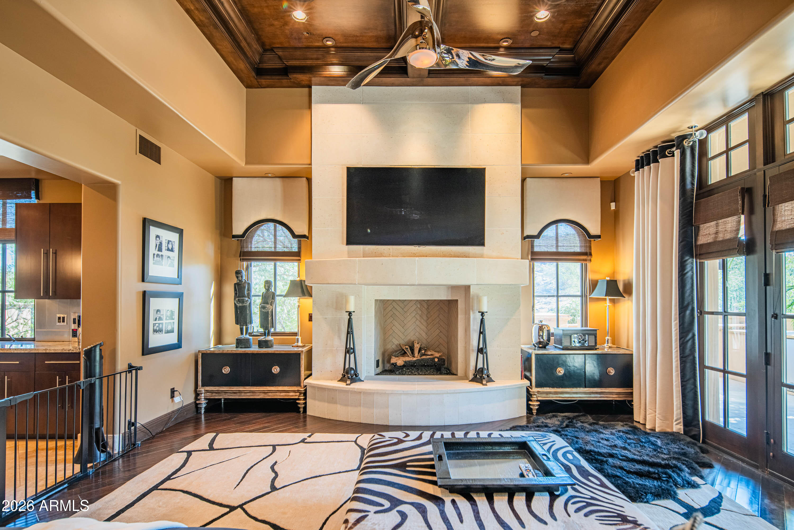 21401 West Granite Ridge Road Buckeye, AZ 85396 - Photo 113 of 144 a living room with fireplace furniture and a flat screen tv